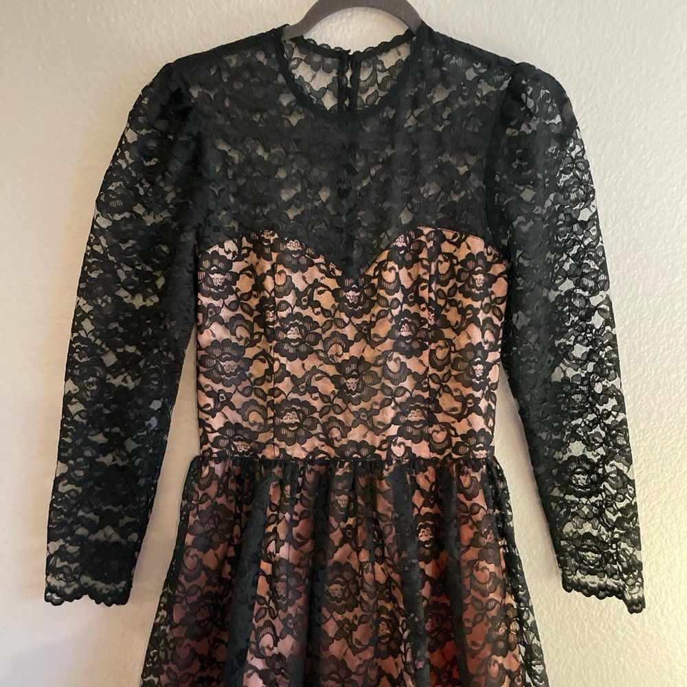 Vintage Lace Midi Dress 
Stunning 80’s lace and silk midi dress.